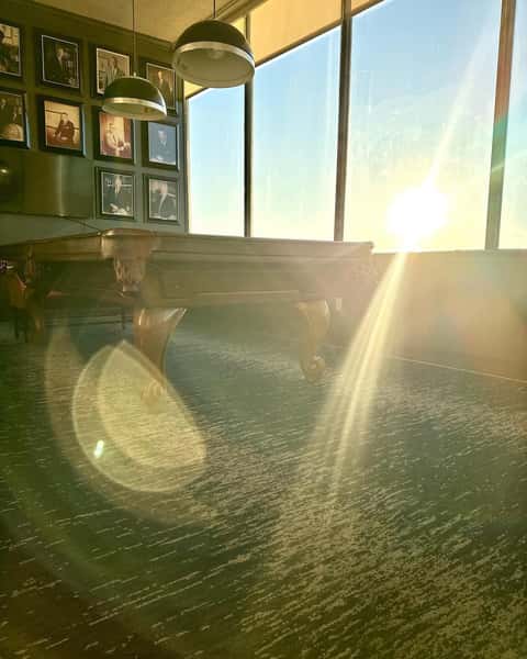 dining room with beams of sunlight
