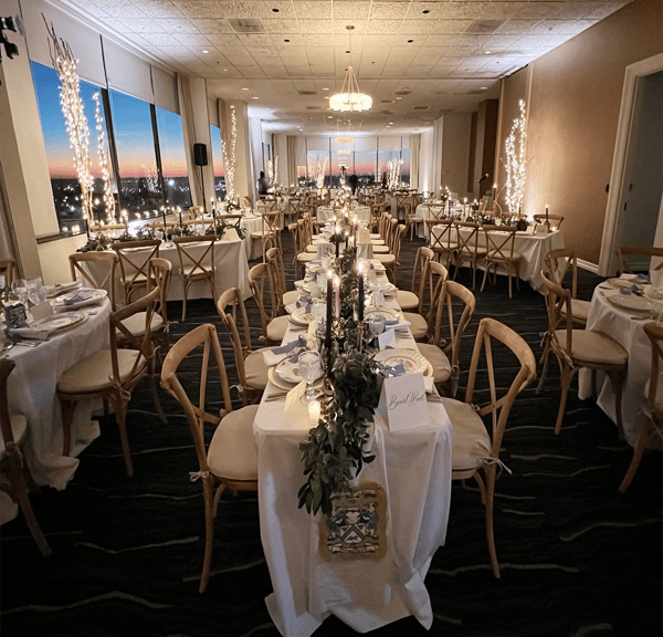 long dining tables set for private event