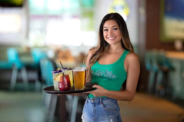 server holding drinks