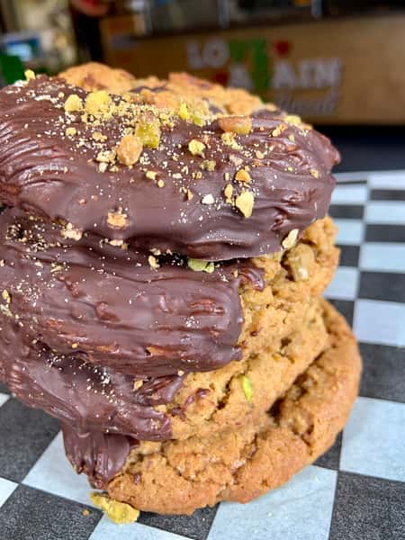 Chocolate dipped pistachio cookie