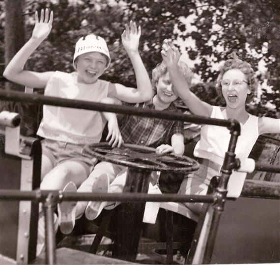 Vintage photo of people on a amusment park ride