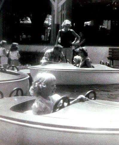 Vintage photo of people on a boat theme attraction