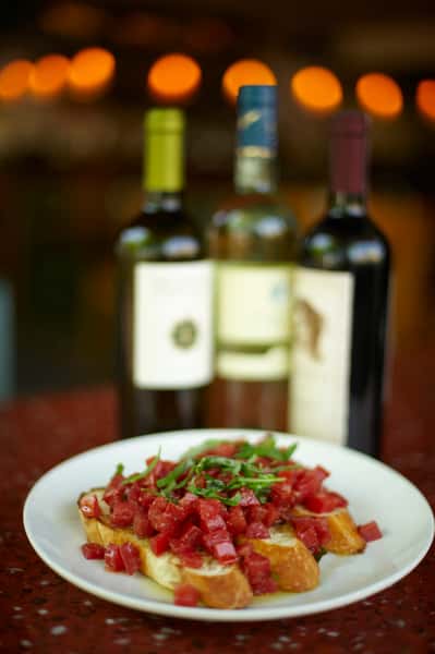 Wine bottles and bruschetta
