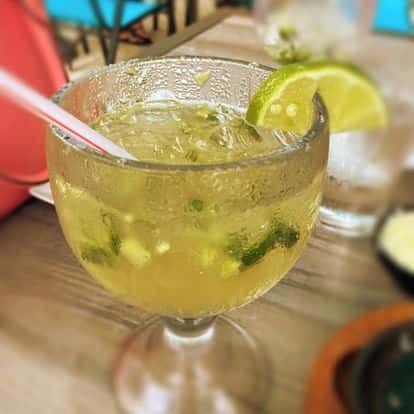 one margarita with salt and limes