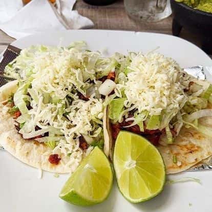 flour tortilla taco and limes
