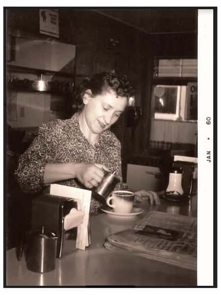 Kitty pouring coffee in La Bella