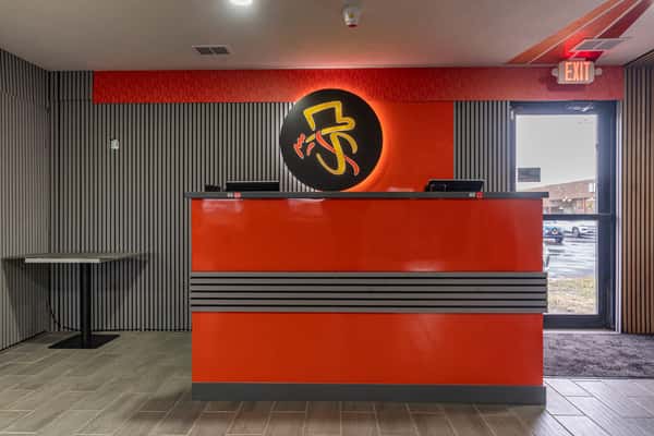 Red check out counter with glowing logo