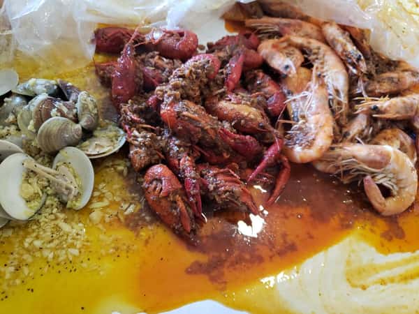 Medium cajun shrimp, crawfish, and clams - Irene R. (Yummy! Meal was on point!).jpeg
