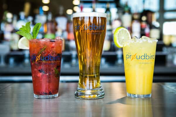 Three cocktails on a bar counter