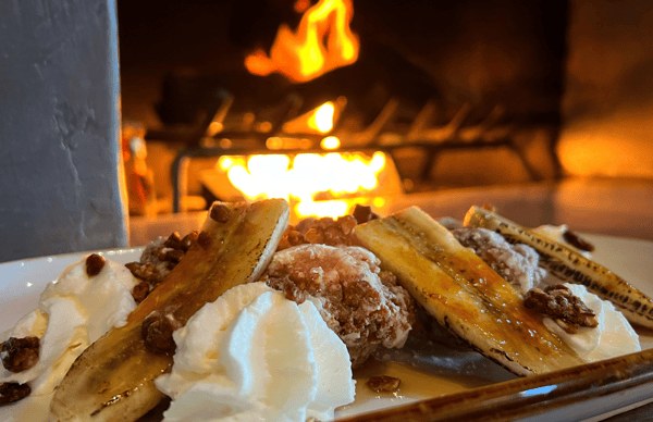 Dessert with whipped cream and banana slices