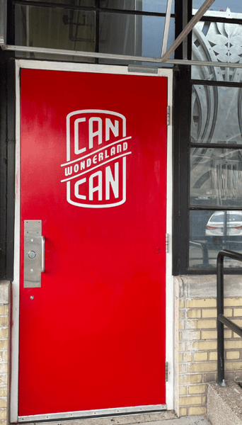 The main entrance to Can Can Wonderland from ground level -- the red door