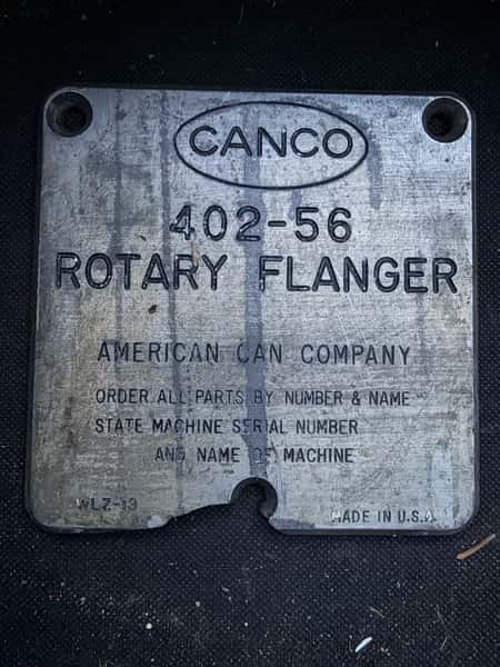 Old metal plate from the CAN CO factory rotary flanger machine
