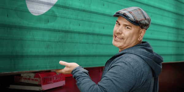 Owner Rob Clapp opening garage door
