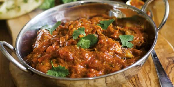 Curry with coriander garnish