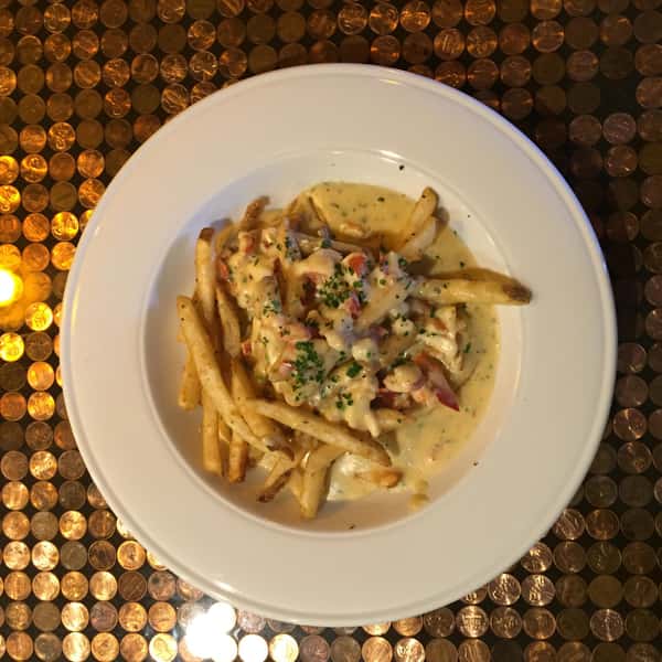 Lobsta fries. Maine lobster in a chipotle cream sauce, served on a bed of our crispy french fries.