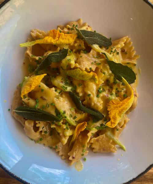 The best summer pasta! Introducing our Aleppo Malfaldine tossed in a silky corn & ricotta cream with fresh zucchini, crispy sage, and a bright finish of lemon. A dish that tastes like summer in every bite. Come try it while it’s on the menu.  #seasonalmenu #eatlocal #atleats