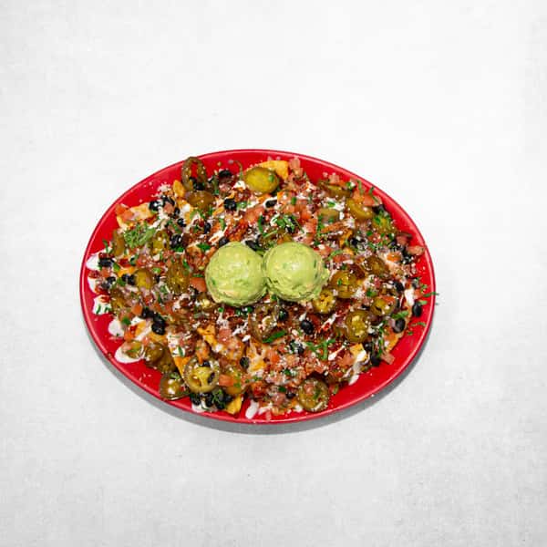 Chipotle Chicken Grande Nachos $12