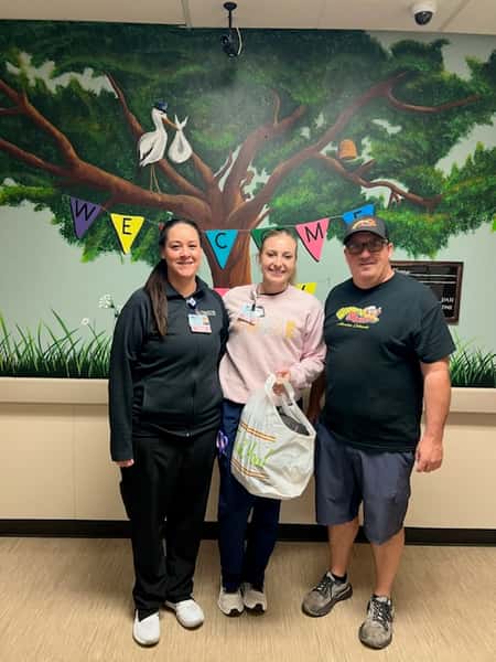 Kyle Woodward of Woody's Q Shack giving back to the local hospital