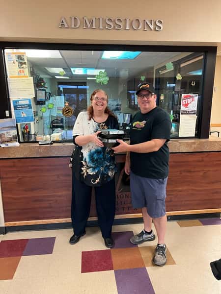 Kyle Woodward of Woody's Q Shack giving back to the local hospital