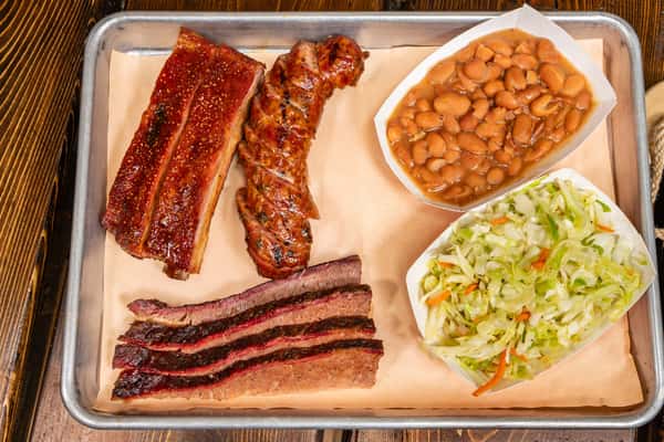 3 Meats and 2 Sides Plate featuring brisket, ribs and sausage