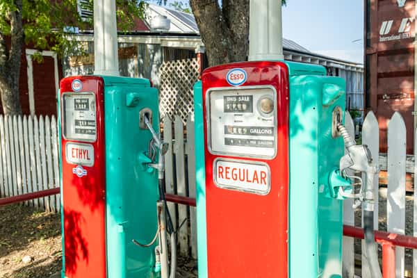 Old vintage style gas pumps in turquoise and red