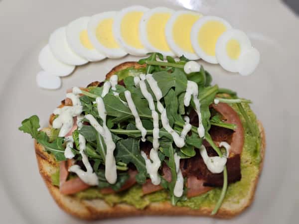 Toasted Sourdough Bread, Avocado, Tomato, Bacon, Hard-Boiled Egg, Arugula, & Basil Aioli