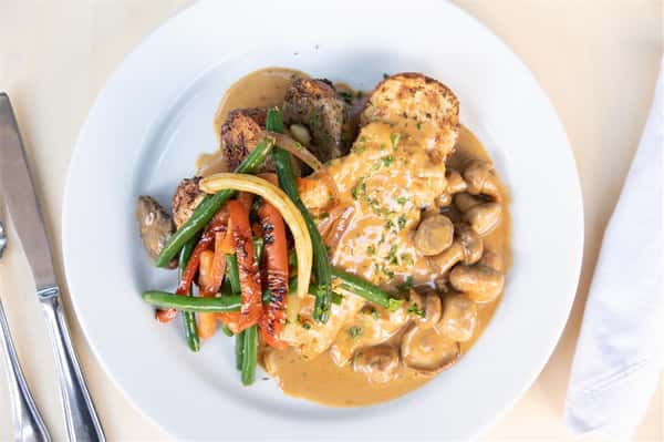 smothered chicken with vegetables