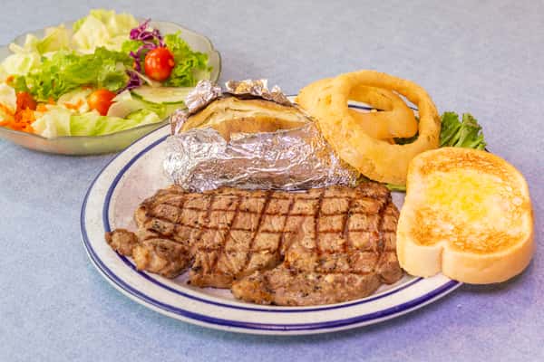 12 Oz Rib-Eye Steak & a Fried or Broiled Seafood Item