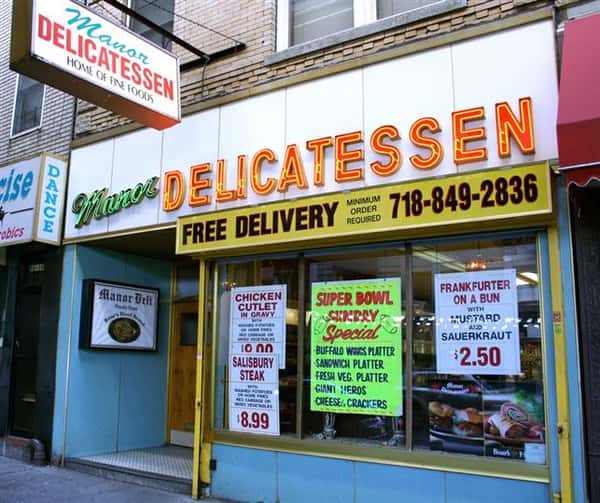 Manor Delicatessen front entrance with sign