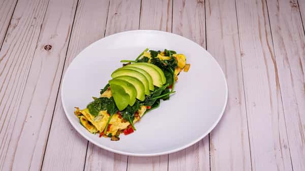 If you want a healthy approach to omelettes this recipe has your name on it; Spinach, mushrooms, bell peppers, onions and Swiss cheese... Of course, topped with avocado for that healthy kick.