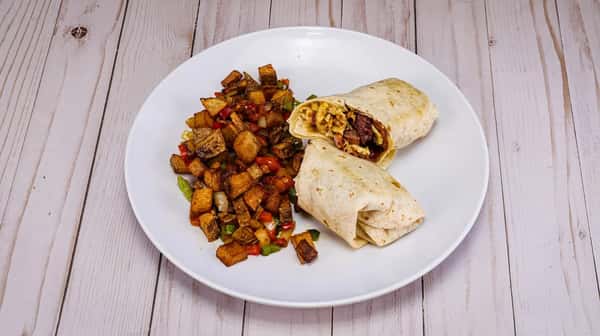 Scrambled eggs*, bacon, sausage, ham, potatoes, cheddar cheese rolled into a flour tortilla