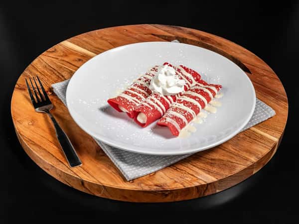 Here is something you don't see everyday… Love red velvet? Now try its fluffy perfection made into a crepe! OMG YUM!