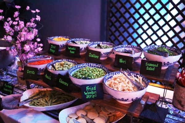 bowls on table filled with different toppings
