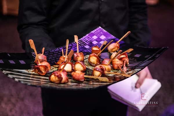 bacon wrapped scallops on platter
