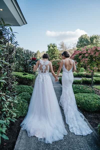 two brides walking