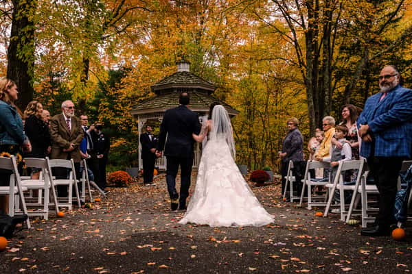 bride and dad walking to ceremony