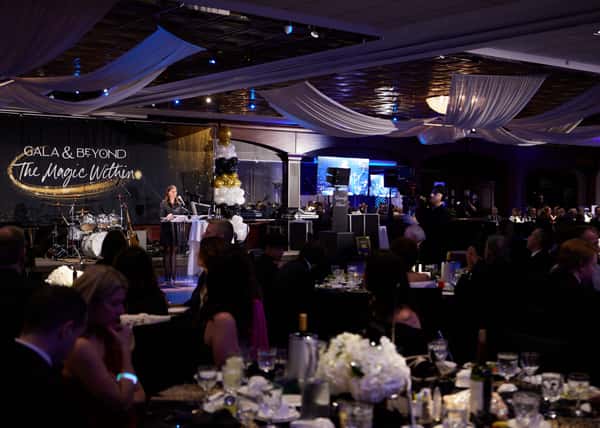 ballroom with tables and dim lighting
