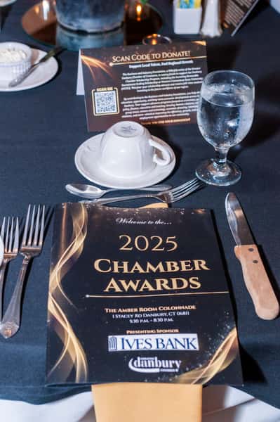 pamphlet on table that says 2025 Chamber Awards
