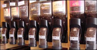 fresh coffee beans in dispensers