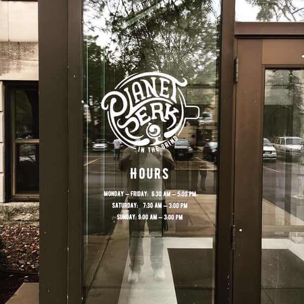 the grind location outdoor window sign
