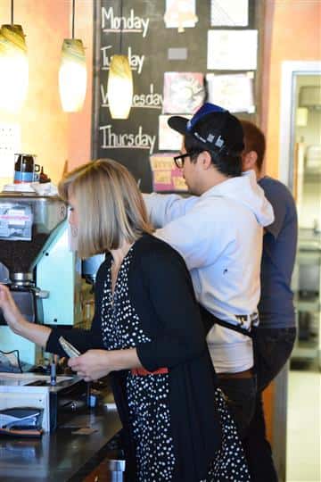 planet perk employees working behind the counter at the city center location