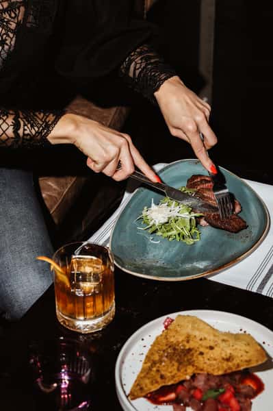 Guest enjoying an entree from MOTO