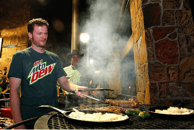 Dale Earnhardt Jr. cooking a Ribeye on the Mesquite Grill
