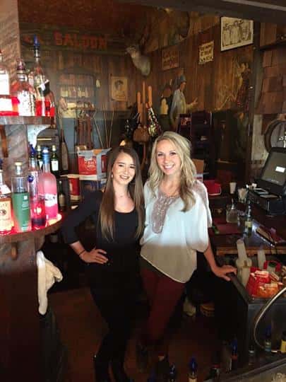 two females posing for picture