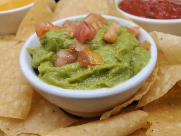 Chips & Queso or Guacamole