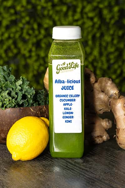 This green juice bottle, labeled "Alba-licious Juice" from Good Life Nutrition.