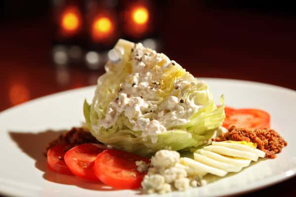 Salad wedge with crumbled blue cheese