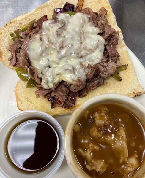 Prime rib melt with homemade mashed potatoes and gravy