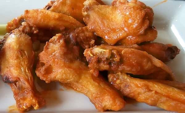 Buffalo chicken wings close up.