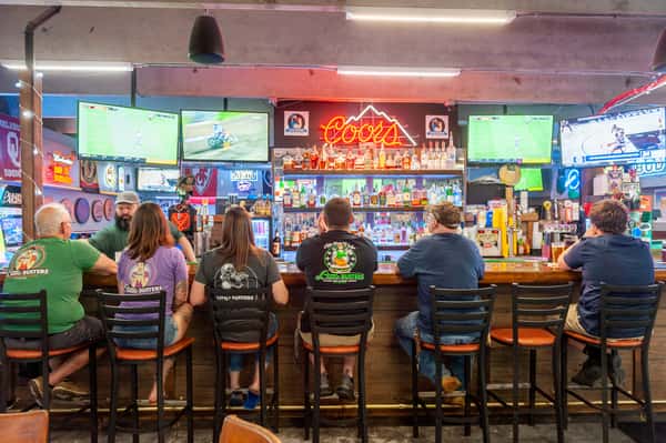 people sitting at the bar